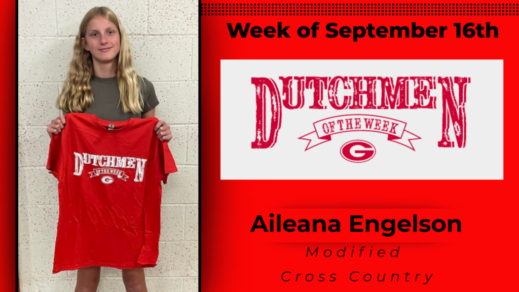 Student holding up Dutchmen of the Week tshirt,