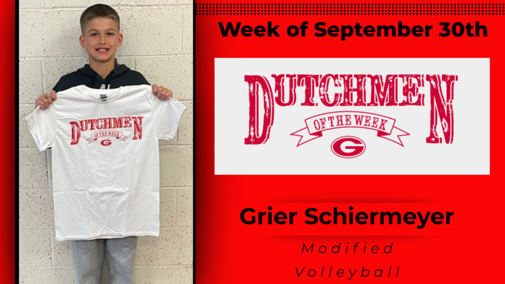 Student holding up Dutchmen of the Week tshirt.