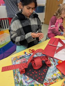 Young student working on an art project.