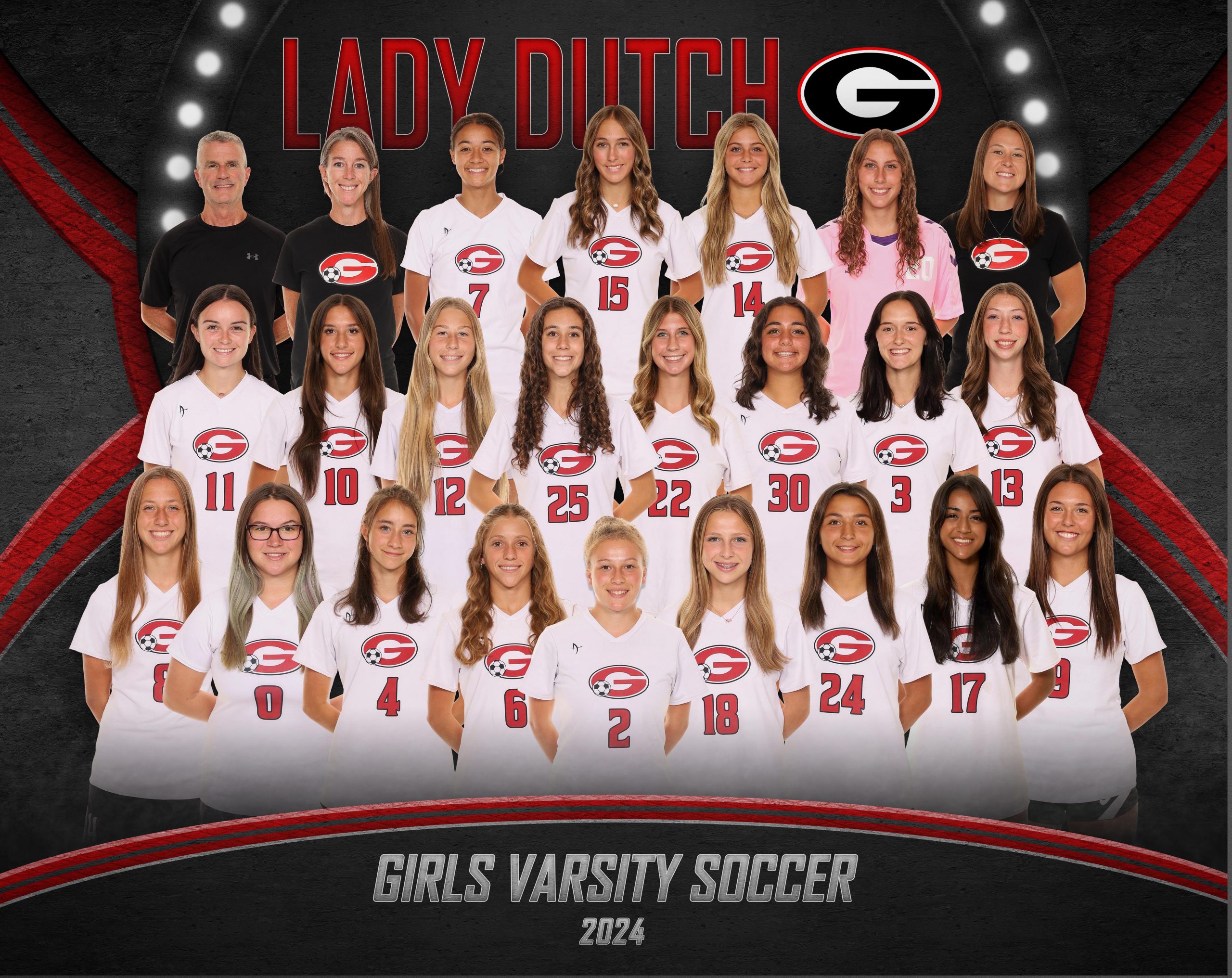 Girls varsity soccer players and three coaches, in three rows. Players are wearing white jerseys with a red G on the front and red numbers. The goalkeeper is wearing a pink jersey. The coaches are wearing black shirts, two of the coaches have a red G and a soccer ball on the front of their shirt.