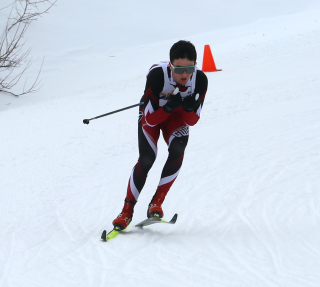 A student is cross country skiing